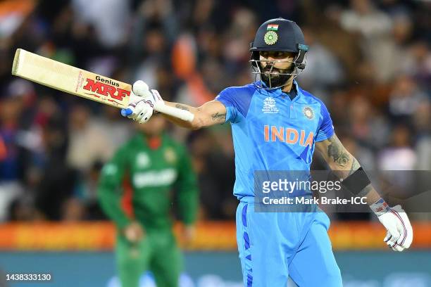 Virat Kohli of India celebrates scoring a half century during the ICC Men's T20 World Cup match between India and Bangladesh at Adelaide Oval on...