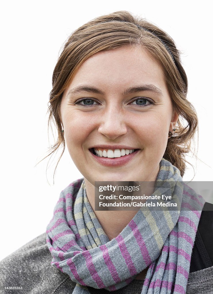 Portrait of young woman, close up, smiling