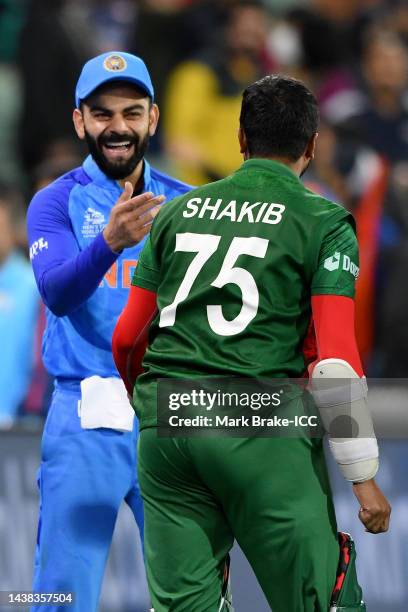 Virat Kohli of India and Shakib Al Hasan of Bangladesh interact during the ICC Men's T20 World Cup match between India and Bangladesh at Adelaide...