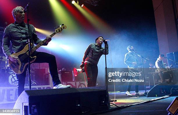 Stuart Richardson, Ian Watkins, Mike Lewis and Jamie Oliver of Lostprophets perform at Brixton Academy on May 4, 2012 in London, England.