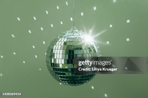 Disco Ball against green background. Disco Ball against green background.