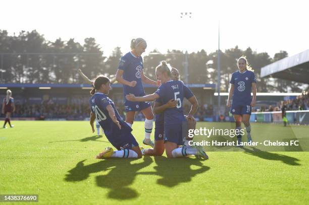 Lauren James of Chelsea celebrates with teammates Sam Kerr andSophie Ingle after scoring her team's first goal during the FA Women's Super League...