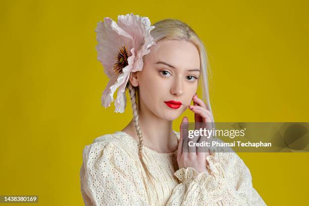 beautiful woman on plain background - hair accessories stockfoto's en -beelden