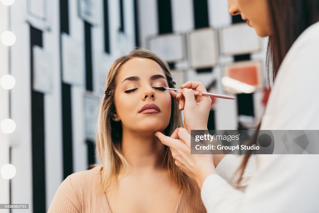 Professional makeup artist at work