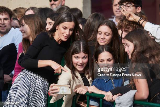 Queen Letizia takes a selfie with a group of girls as they leave the 22nd edition of the 'Festival de Cine Opera Prima Ciudad de Tudela', at the Cine...