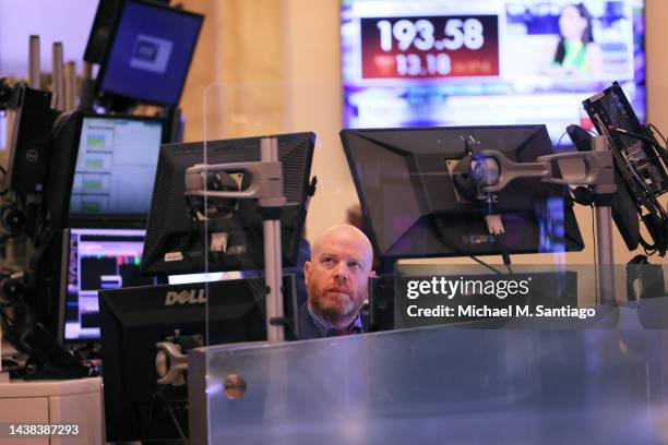 Traders work on the floor of the New York Stock Exchange during morning trading on November 02, 2022 in New York City. Stocks opened low this morning...