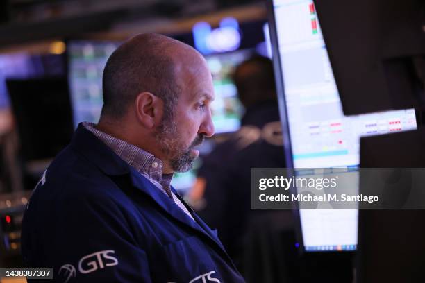 Traders work on the floor of the New York Stock Exchange during morning trading on November 02, 2022 in New York City. Stocks opened low this morning...