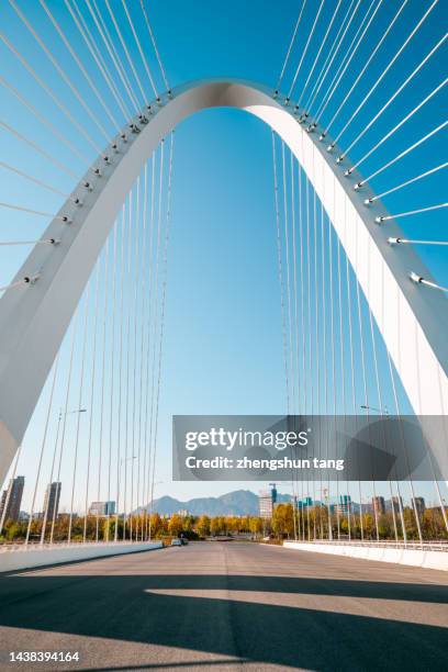 empty highway of the modern bridge - bridge low angle view stock pictures, royalty-free photos & images