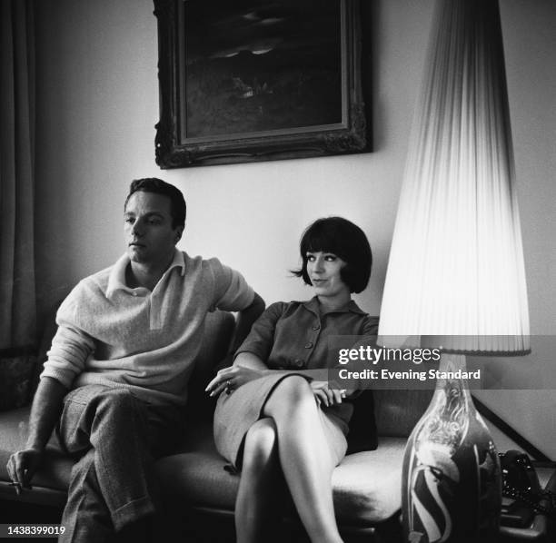 British ballet dancers John Gilpin and wife Sally Judd sitting side by side on a sofa on January 10th, 1960.