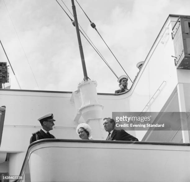 Princess Margaret and husband Antony Armstrong-Jones on the bridge of HMY Britannia at Portsmouth after returning from a six-week honeymoon cruise in...