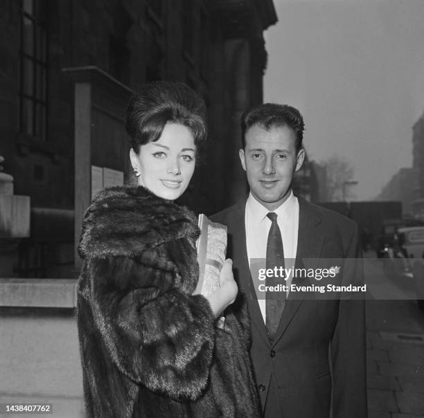 British writer Jackie Collins with her husband Wallace Austin on their wedding day in London, December 13th, 1960. The couple were married at...