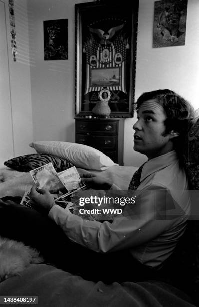 Jamie Auchincloss answers questions during an interview in his apartment.