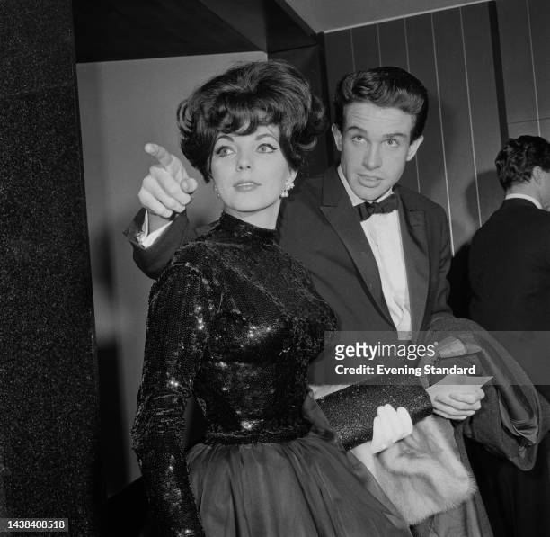 British actress Joan Collins and American actor Warren Beatty at an event on March 4th, 1961.