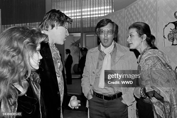 Jennifer Jason Leigh, Gary Busey, William Friedkin, and guest attend an event at the MGM lot in Culver City, California, on January 28, 1983.