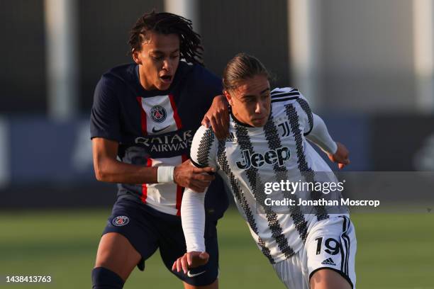 Ethan Mbappe of PSG tussles with Kenan Yildiz of Juventus during the UEFA Youth League Group H match between Juventus and Paris Saint-Germain at...