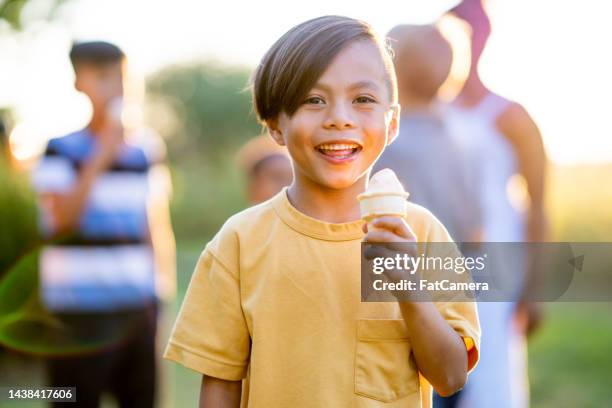 kids eating ice cream - filipino family eating stock pictures, royalty-free photos & images