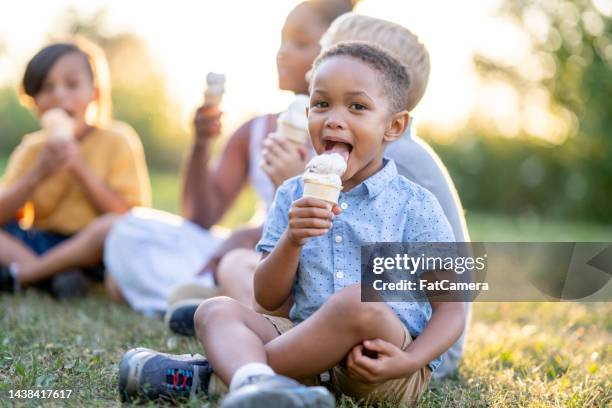 kids eating ice cream - mr whippy ice cream stock pictures, royalty-free photos & images