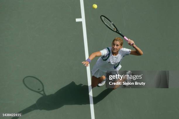 Monica Seles from Yugoslavia keeps her eyes on the tennis ball as she serves to Shaun Stafford of the United States during their Women's Singles...