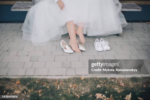 bride changing the shoes. - ballet feet hurt stock pictures, royalty-free photos & images