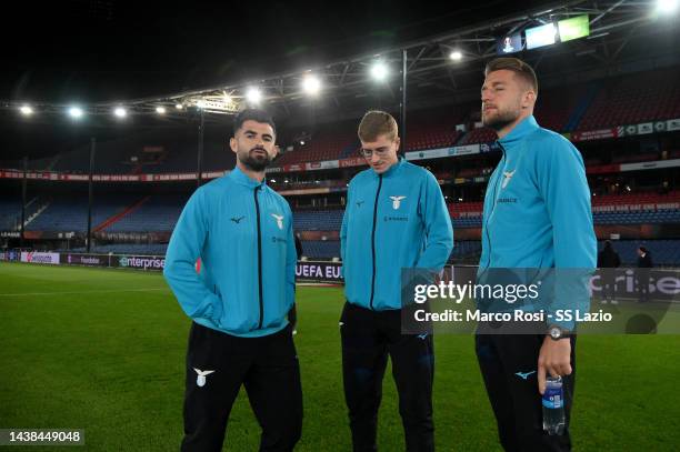 Elseid Hysay, Toma Basic and Sergej Milinkovic Savic look the pitch during the walk araund at De Kuip on November 02, 2022 in Rotterdam, Netherlands.