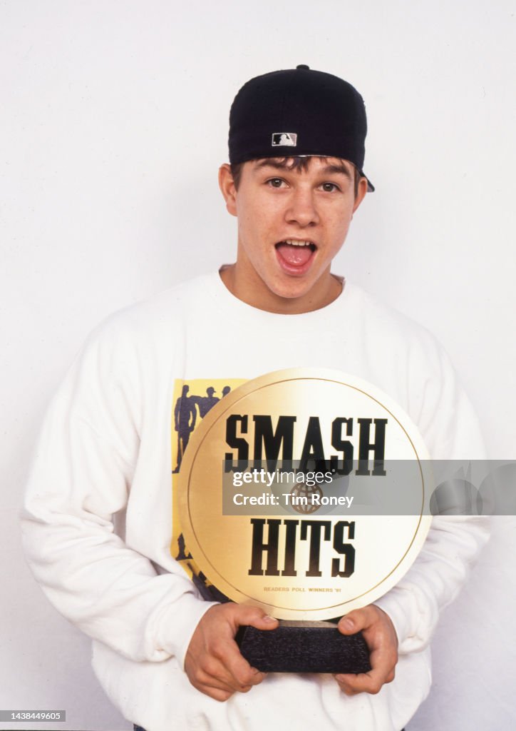 The Rapper Marky Mark American hip hop performer Marky Mark poses with a Smash Hits award ...