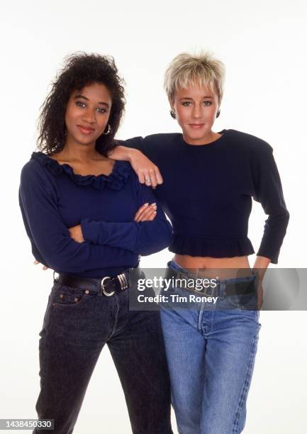 Portrait of British Pop singers Helen DeMacque and Shirlie Holliman, who perform as Pepsi & Shirlie, as they pose against a white background, circa...