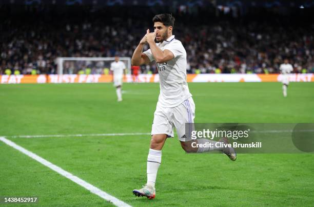 Marco Asensio of Real Madrid celebrates after scoring their sides third goal during the UEFA Champions League group F match between Real Madrid and...
