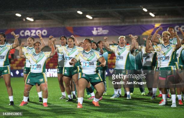 Players of Cook Islands perform the Maori Ura prior to the Women's Rugby League World Cup 2021 Pool B match between Australia Women and Cook Islands...