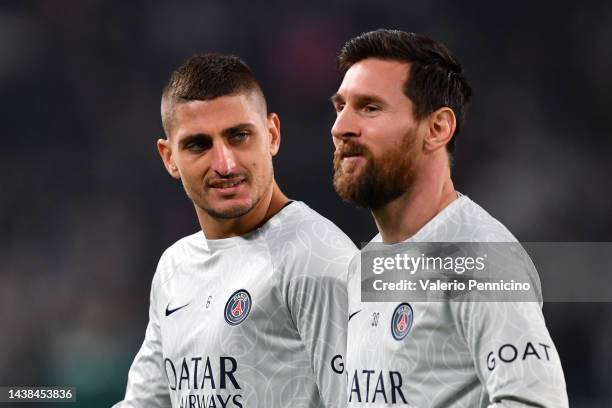 Marco Verratti and Lionel Messi of Paris Saint-Germain look on prior to the UEFA Champions League Group H match between Juventus and Paris...