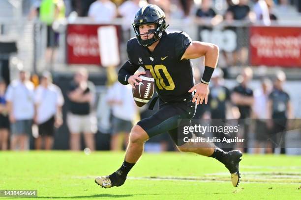 John Rhys Plumlee of the UCF Knights runs with the ball during the first half of a game against the Cincinnati Bearcats at FBC Mortgage Stadium on...