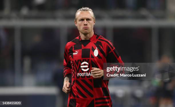 Simon Kjaer of AC Milan warms up prior to the UEFA Champions League group E match between AC Milan and FC Salzburg at Giuseppe Meazza Stadium on...