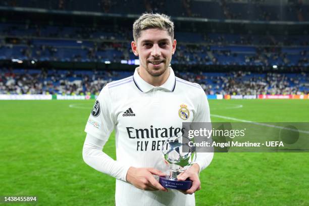 Federico Valverde of Real Madrid poses with the PlayStation Player of the Match award after the UEFA Champions League group F match between Real...