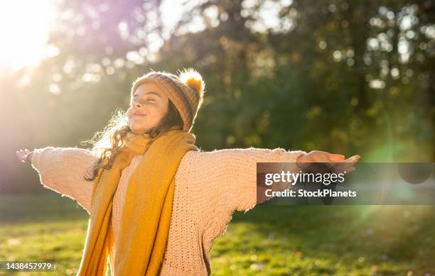 portrait of a girl enjoying nature - breath stock pictures, royalty-free photos & images