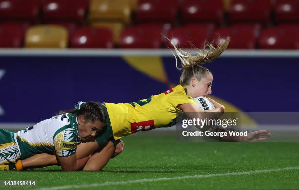 Tarryn Aiken of Australia touches down for their team's third try during the Women's Rugby League World Cup 2021 Pool B match between Australia Women...