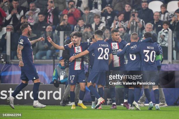 Kylian Mbappe of Paris Saint-Germain celebrates with team mates after scoring their sides first goal during the UEFA Champions League Group H match...