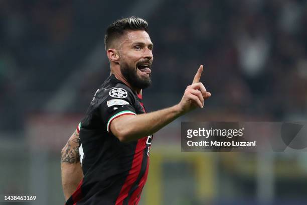Olivier Giroud of AC Milan celebrates after scoring their team's first goal during the UEFA Champions League group E match between AC Milan and FC...