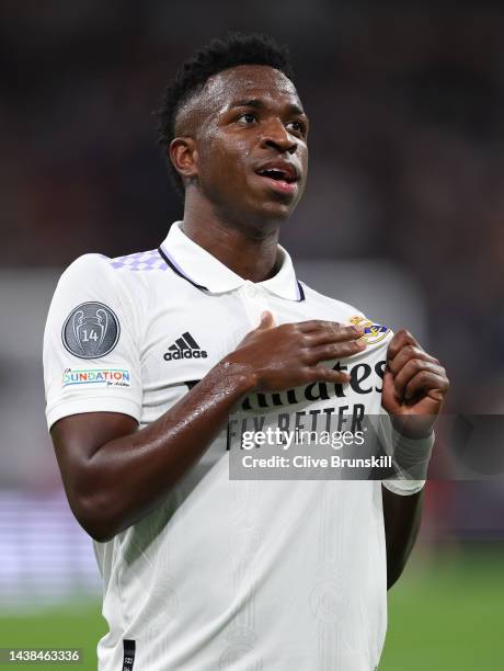 Vinicius Junior of Real Madrid celebrates after scoring their sides fourth goal during the UEFA Champions League group F match between Real Madrid...