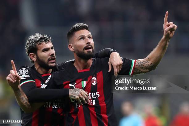 Olivier Giroud celebrates with Theo Hernandez of AC Milan after scoring their team's first goal during the UEFA Champions League group E match...