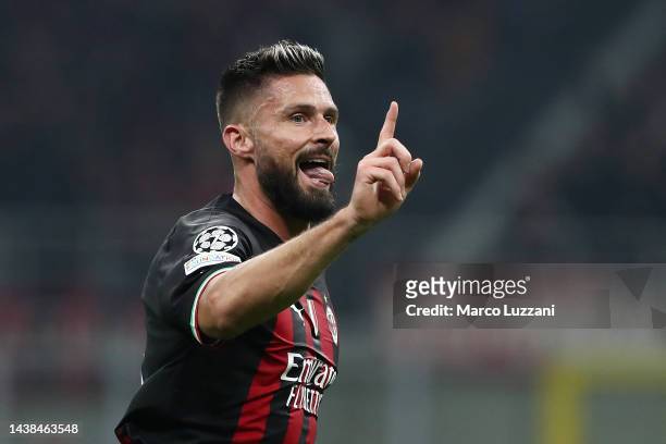 Olivier Giroud of AC Milan celebrates after scoring their team's first goal during the UEFA Champions League group E match between AC Milan and FC...