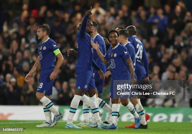 Denis Zakaria celebrates with Raheem Sterling of Chelsea after scoring their team's second goal during the UEFA Champions League group E match...