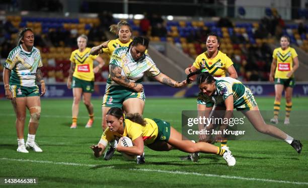Taliah Fuimaono of Australia goes over to score their sides nine try during the Women's Rugby League World Cup 2021 Pool B match between Australia...
