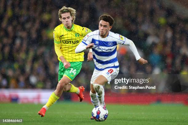 Luke Amos of Queens Park Rangers is challenged by Todd Cantwell of Norwich City during the Sky Bet Championship between Norwich City and Queens Park...