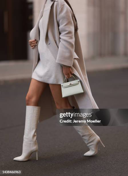 Leo Eberlin wearing Zara beige coat, H&M beige knit sweater dress, Hermes light green mini leather Kelly bag, Paris Texas beige leather boots and Leo...