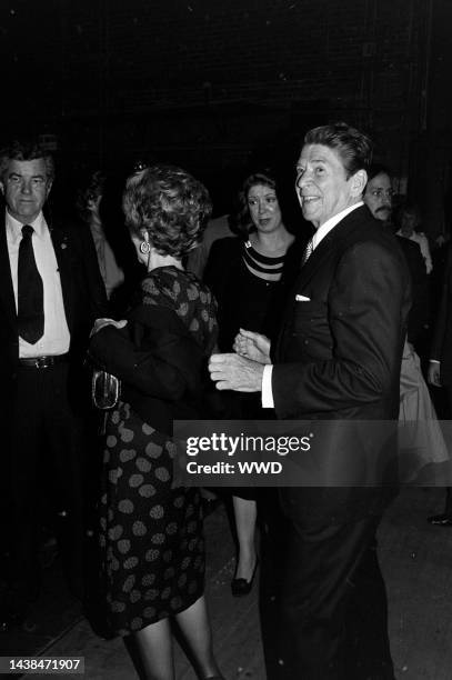 Nancy Reagan , Kasey McCoy , and Ronald Reagan attend a performance at Lisner Auditorium, on the campus of George Washington University, in...