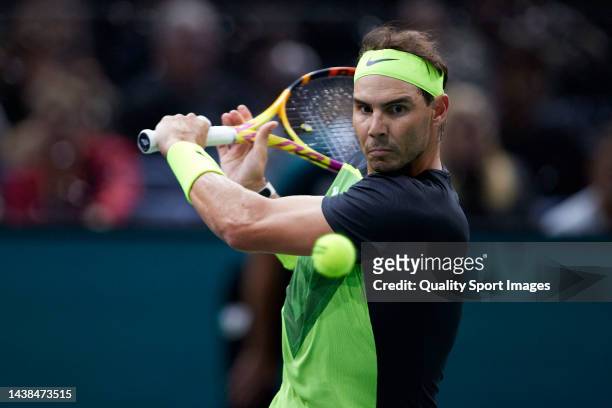 Rafael Nadal of Spain returns a ball against Tommy Paul of the United States in the second round during Day Three of the Rolex Paris Masters tennis...