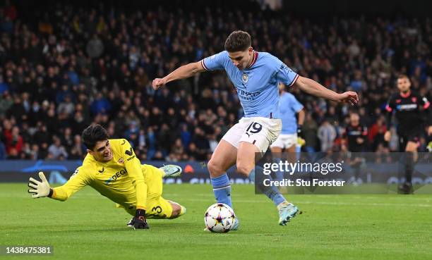 Julian Alvarez of Manchester City scores their sides second goal past Yassine Bounou of Sevilla FC during the UEFA Champions League group G match...