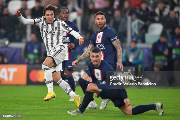 Federico Chiesa of Juventus shoots during the UEFA Champions League Group H match between Juventus and Paris Saint-Germain at Juventus Stadium on...