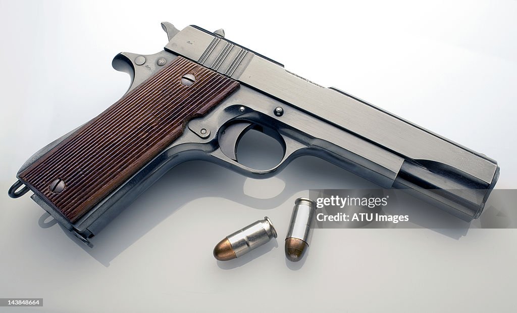 45 automatic pistol profile with bullets