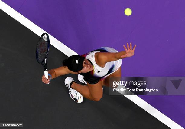 Jessica Pegula of the United States serves against Ons Jabeur of Tunisia in their Women's Singles Group Stage match during the 2022 WTA Finals, part...