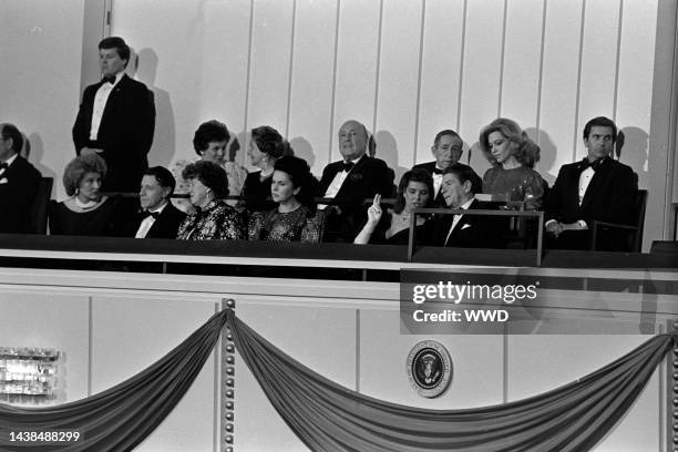 Jerry Zipkin , Leonard Silverstein , Lynn Wyatt , Princess Caroline of Monaco , and Ronald Reagan attend a reading of Ogden Nash verses, set to the...